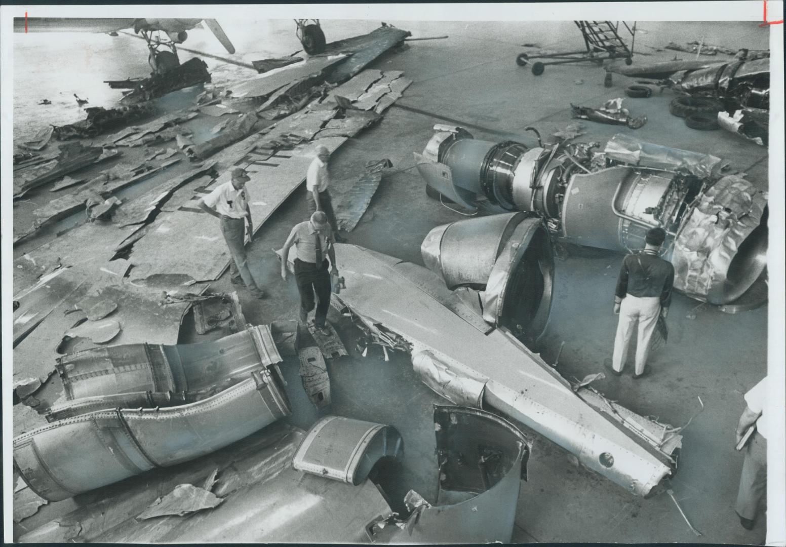 stigators piece together the wreckage of DC-8 whcih crashed outside Malton in 1970 killing all 109 aboard