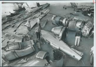 stigators piece together the wreckage of DC-8 whcih crashed outside Malton in 1970 killing all 109 aboard