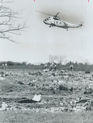 Armed forces helicopter starts airlifting bodies out