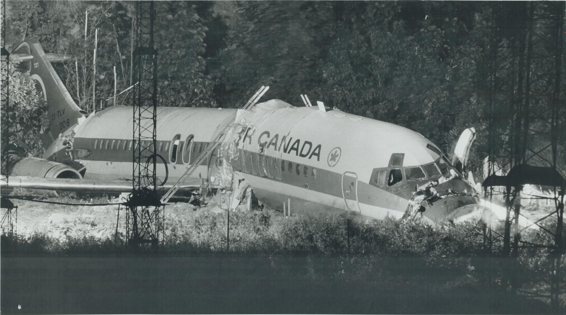 Two people died and 105 were injured when Air Canada DC-9 skidded into ravine and broke up at Toronto International Airport