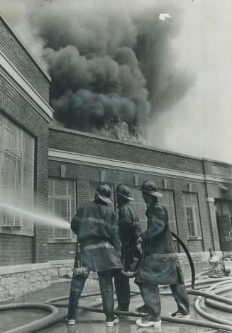 Sometimes three men are assigned to hold fire hose