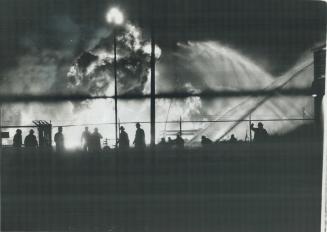 Mushrooming flames and smoke belch from refinery fire at Port Credit after pipeline exploded