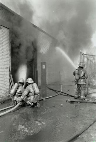 Factory Fire. Etobicoke firefighters battle a two-alarm blaze that caused $300.000 damage to a plant in the North Queen St. and Islington Ave. area yesterday