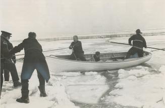 Plucked from cake of ice on which he floated for half an hour before rescuers could reach him, 11-year-old Ciaran Griffin huddles under a blanket in a(...)