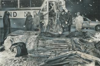 The crushed wreck of a burned-out car and an Ontario Northland bus were among the scores of vehicles involved in Canada's worst-ever road disaster, la(...)