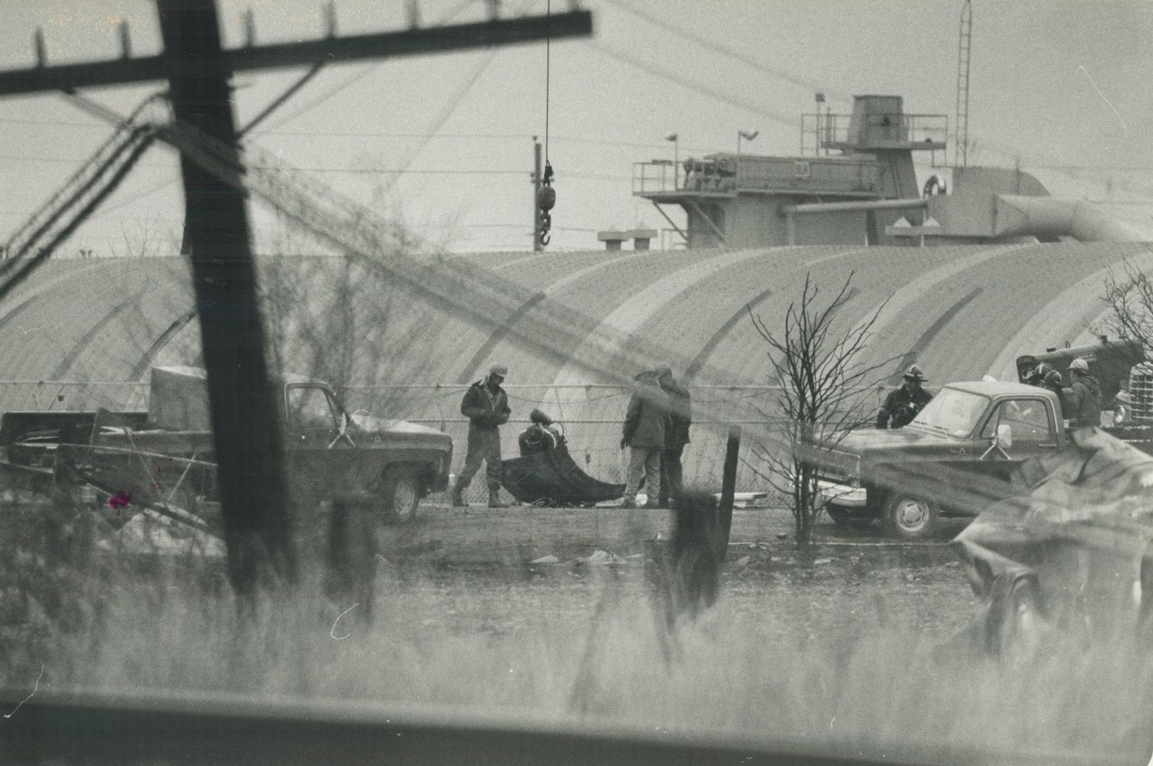 The problem was chlorine. Deadly chlorine leaking from a punctured tanker. The solution was a patch - one hoisted by block and tackle and made of stee(...)