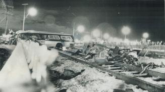 Wreckage of TTC bus lies strewn along tracks after being hit by go train