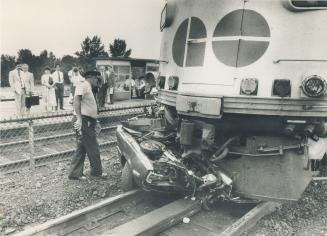 No contest: There's usually not much left when a moving train hits a car or truck, as the driver of this wreck discovered last year when he left it stalled on a Scarborough railway line