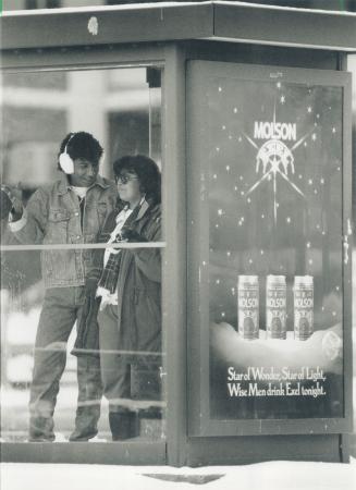 Parody panned: This advertisement in a bus shelter is criticized for using a Christmas symbol in a way the United Church's moderator says is insensitive