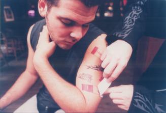 Molson gives away Tattoos with their logos