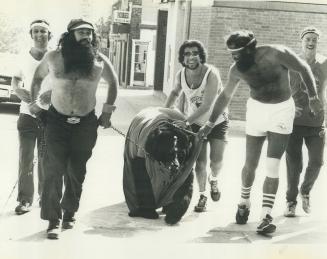 Smokey the bear jogs for charity