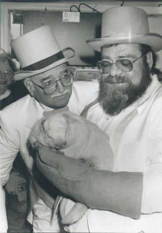 Wiarton Willie with Trainer: Sam Brouwer (right) and Mayor Barney McKillop
