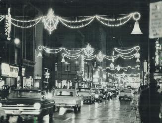 Yonge St. Looking North from King. You'll need a tripod and right time exposure