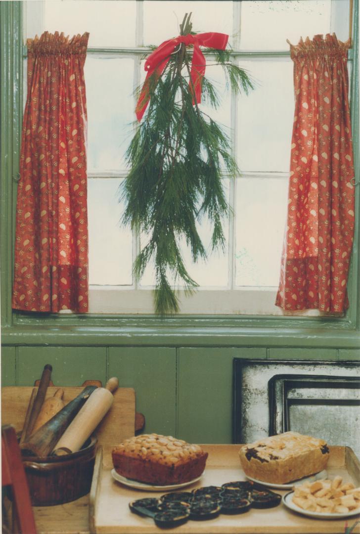Simpler Times: A simple evergreen bough in the window at Gibson House is typical of 19th-century Christmas decorating