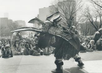 Dancing for the earth. A member of the Haida nation performs a mask dance at Queen's Park yesterday. Part of the Earth Day celebrations organized by P(...)