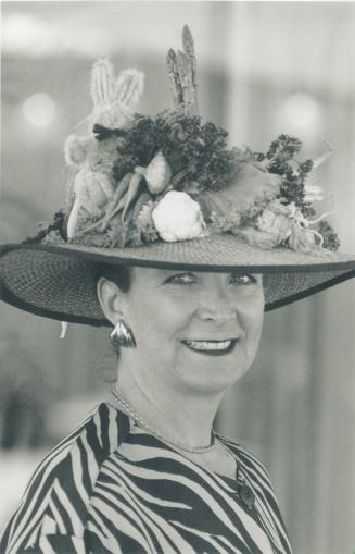 Below left, Lani Moses won the prize for the most show-stopping hat with her fresh veggies