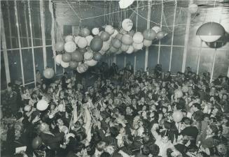 Historic photo from Saturday, January 1, 1972 - About 700 people at a New Years Eve party in one of the Ontario Place pavilion pods in Ontario Place