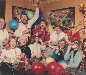 Ringing in a brand new year. Whistles, party hats and balloons helped these New Year's Eve revellers at the Duke of Gloucester pub on Yonge St. welcom(...)