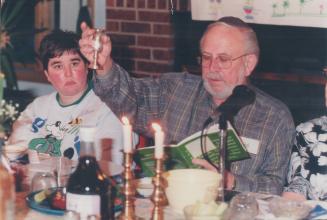 Special Time: Ellen Weinstein watches as her father Harold chants the blessing over the wine