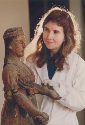 Treasure from the past. Linda Twitchell, assistant to the curator at the Halton Region Museum in Milton, looks over a wooden cigar store Indian that i(...)