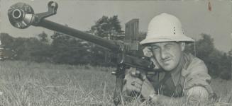 Among the small airms included in platoon weapons is the Boys' anti-tank rifle, shown above, somewhat reminiscent of the old elephant gun. It fires a (...)