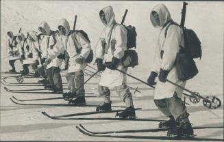 Ski troops traning for manoeuvres in the frozen north are well equipped