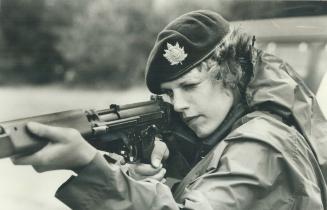 Unusual vacation. Not many women spend their summer vacation out on the rifle range unless they're on the Canadian Forces militia, like Pte. Mayo Sche(...)