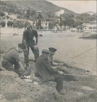Peaceful pastime for Canadian soldiers at the British Red Cross rest camps in Sicily is fishing in the Mediterranean