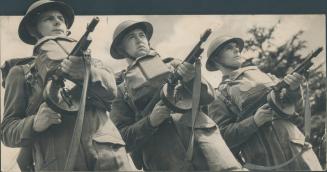 Tommies with Tommy guns now defend the beaches of Britain