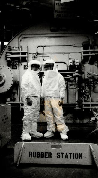 Technicians in front of the air lock before entering reactor 2 area