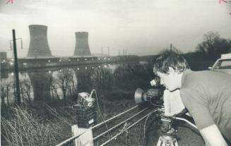 Worker checks radiation levels during Three Mile Island mishap: Terrorists learned from it