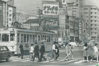Hiroshima, 25 years after being struck by the first atomic bomb set off to kill, has become a planned and strangely unattractive city of shacks and co(...)