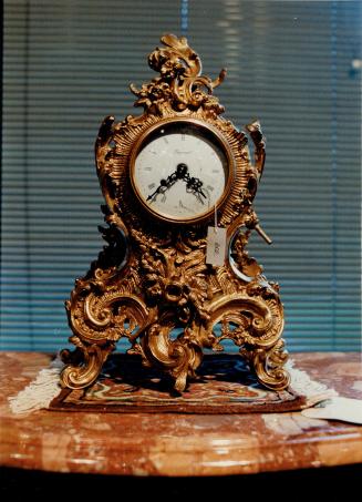 A rococo ormolu clock, oriental rug and an antique bust are typical of the items that are for sale at Toronto's auction houses