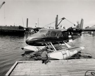 Ready for takeoff: A Twin Otter, just equipped with floats is checked out before flying from the sault to Gogama, north of Sudbury, to be placed on standby
