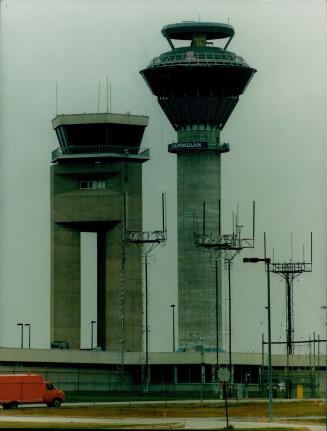 New tower (left) nears completion