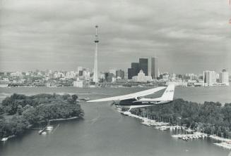 Toronto Island Airport, Centre left, is threatened with closing and Jean Marchand, federal transport minister, has requested a meeting with provincial(...)