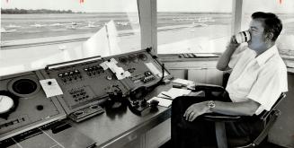 At Toronto Island Airport, chief air traffic controller Doug Stewart mans the tower