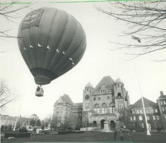 Hot air over the legislature. A huge hot-air ballon floated over the Legislature today to let the public know three Metro men ? Ernie Lee, 35, a ballo(...)