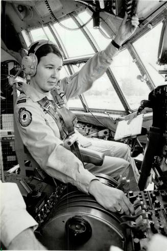 At the controls: Capt. Leah Mosher, above, qualified earlier this year as an aircraft commander with the 436 Squadron. The women are neither stronger,(...)