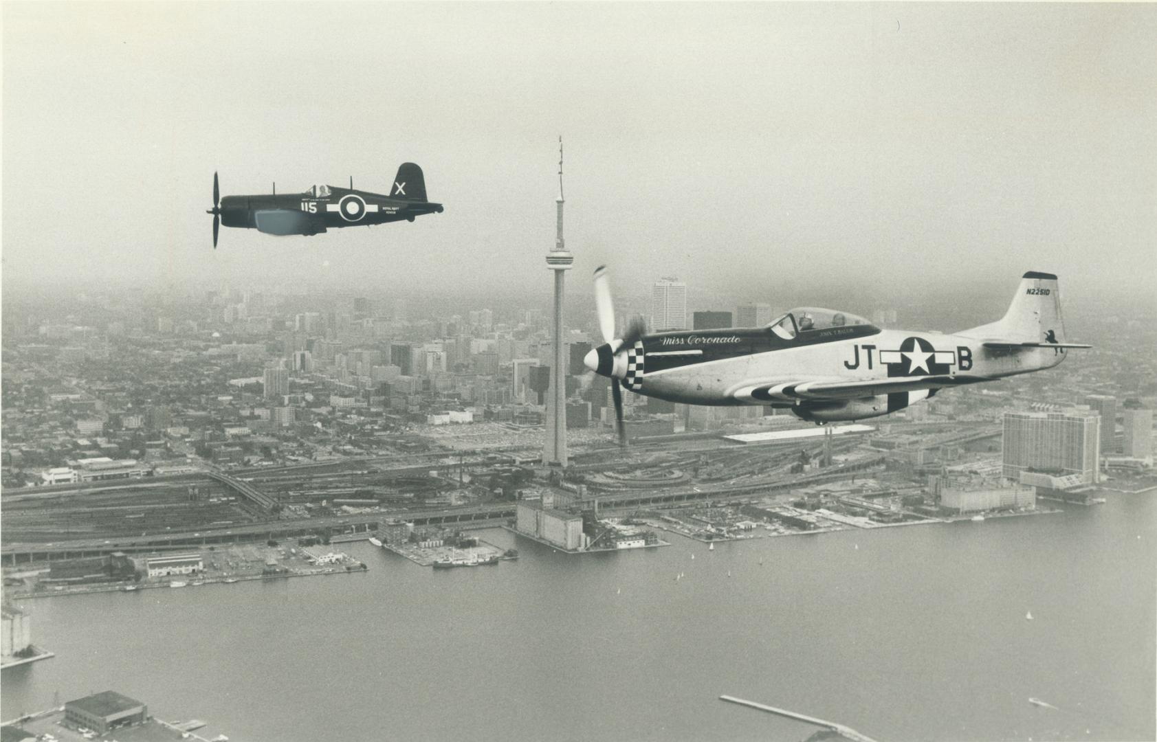 Taking flight. World War II fighter planes, including a Corsair, left, and a Mustang, flew over Toronto yesterday in a preview of the Hamilton Interna(...)