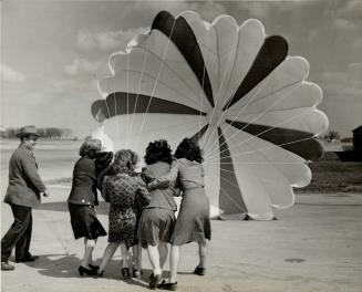 Packing parachutes is one important task before the Malton school closes and before they are packed they must be tested