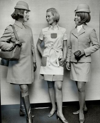 Ready for their easter parade. The stewardesses of Pan Am have these new outfits ready for the Easter Parade. They consist of a gold jumper and a blue(...)