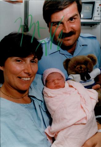 Susan Rocha with Baby and Firefighter Michael MacDonald