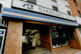 Asset freeze: The 30 branch offices of Standard Trust, including this one in Brampton, were closed yesterday in a move to protect depositors, federal officials said