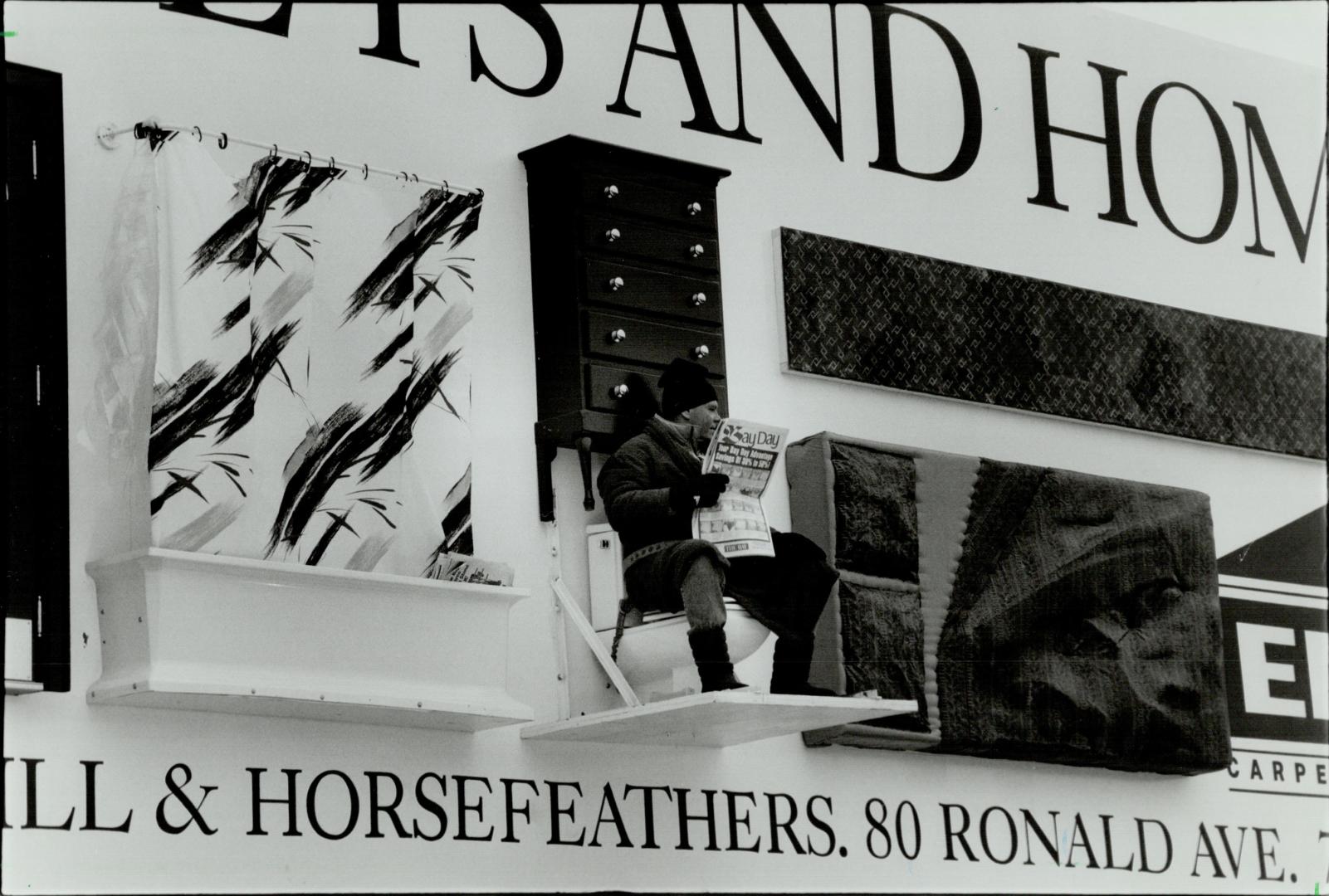 Live on the spot. Adrian Herschell, manager of Ginger's Bath Centre, takes his turn on a 48-foot-by-14-foot three-dimensional billboard at Bloor and P(...)