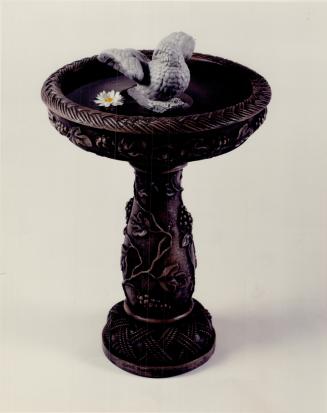 E.), $695. Concrete bird bath, $149 and dove, $40, are from Weall and Cullen, 784 Sheppard Ave. E. Below