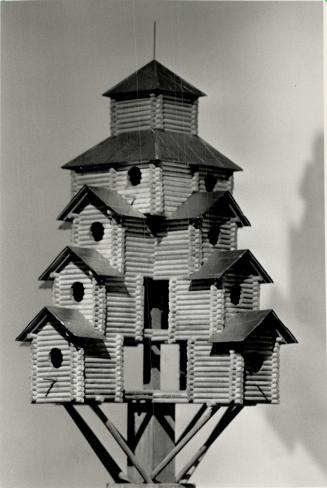 Condo life: Blue Birds Castle, by architect Janis Kravis, with its tiny logs and copper roofs, is delighting children at the Royal Ontario Museum's Art for the Birds show