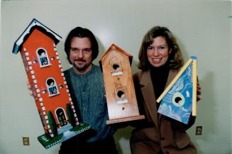 Home tweet home. Karl Kucynski and Wendy McCaughan, two local artists, show off colorful birdhouses they and other artists painted. The houses will be(...)