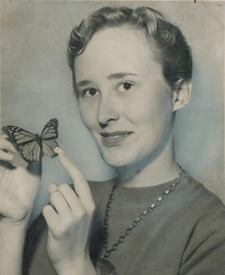 Marjorie Reid shows Butterfly Lloyd He flew from Meaford to Crisfield, Md