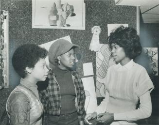Discussing the planned congress with youth chairman Janis Waithe, right, are high school students Carol Campbell, left, and Diana Braithwaite. Janis i(...)